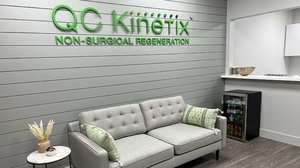 Clean, professional medical spa treatment room with neutral tones at QC Kinetix - Richmond in Richmond
